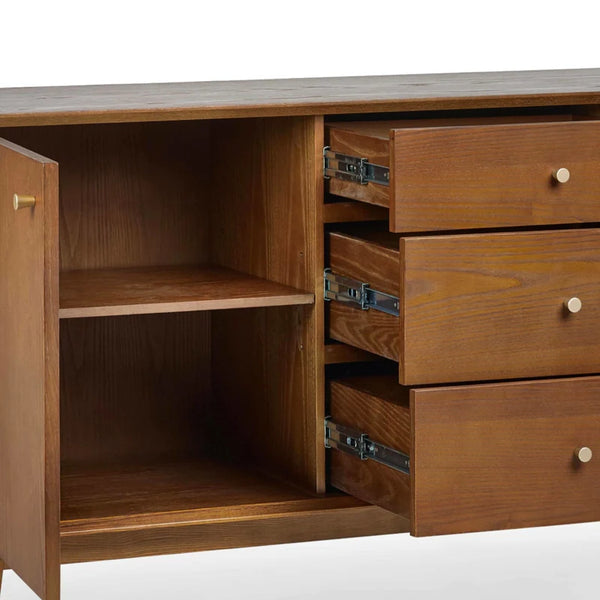 Wooden cabinet with open drawers on a white background