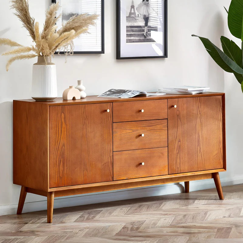 Wooden sideboard with drawers and doors on a white background