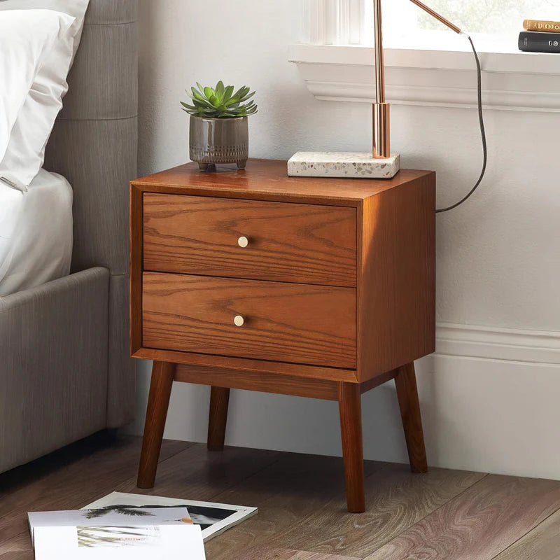 Wooden nightstand with two drawers on a white background