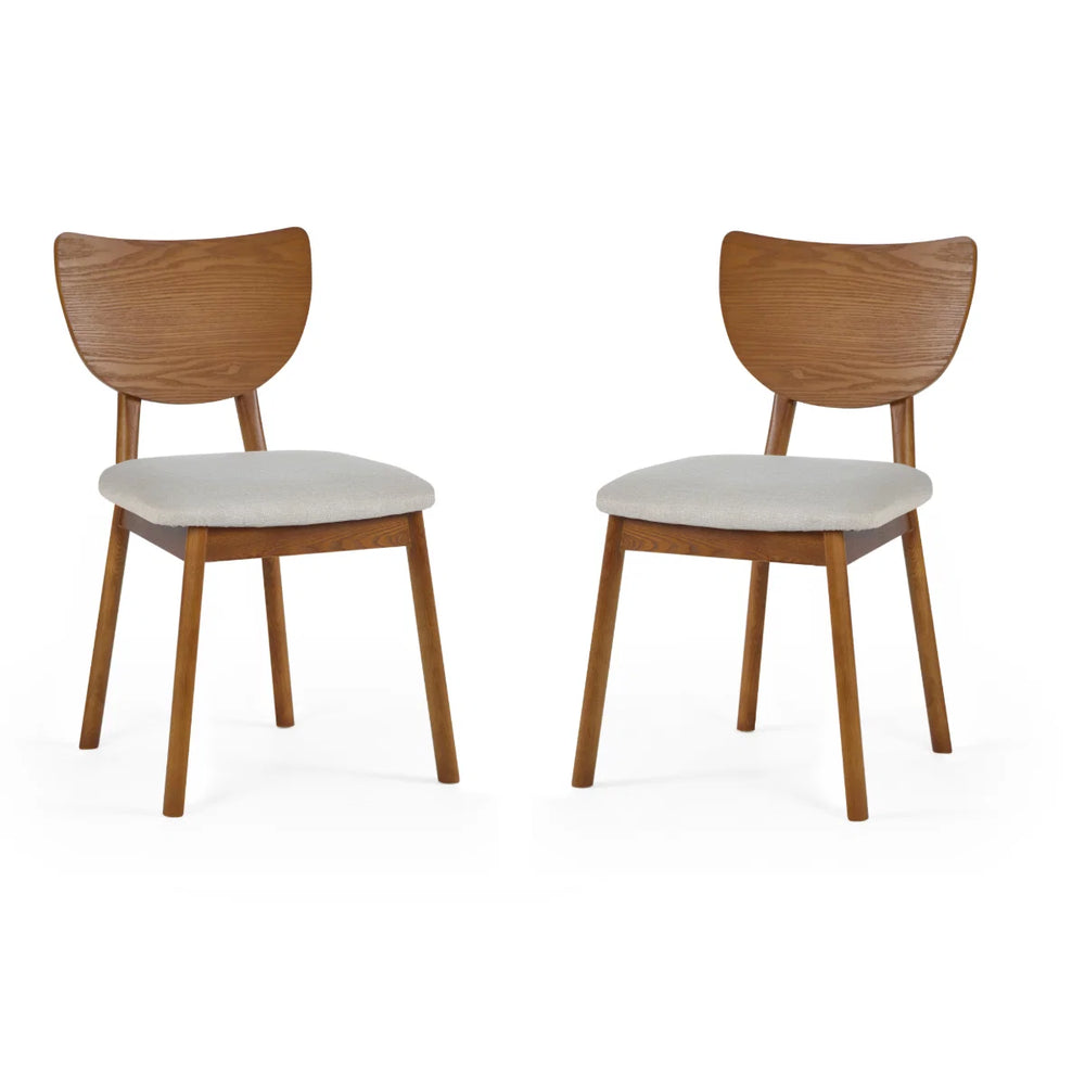 Two wooden chairs with white seats on a white background