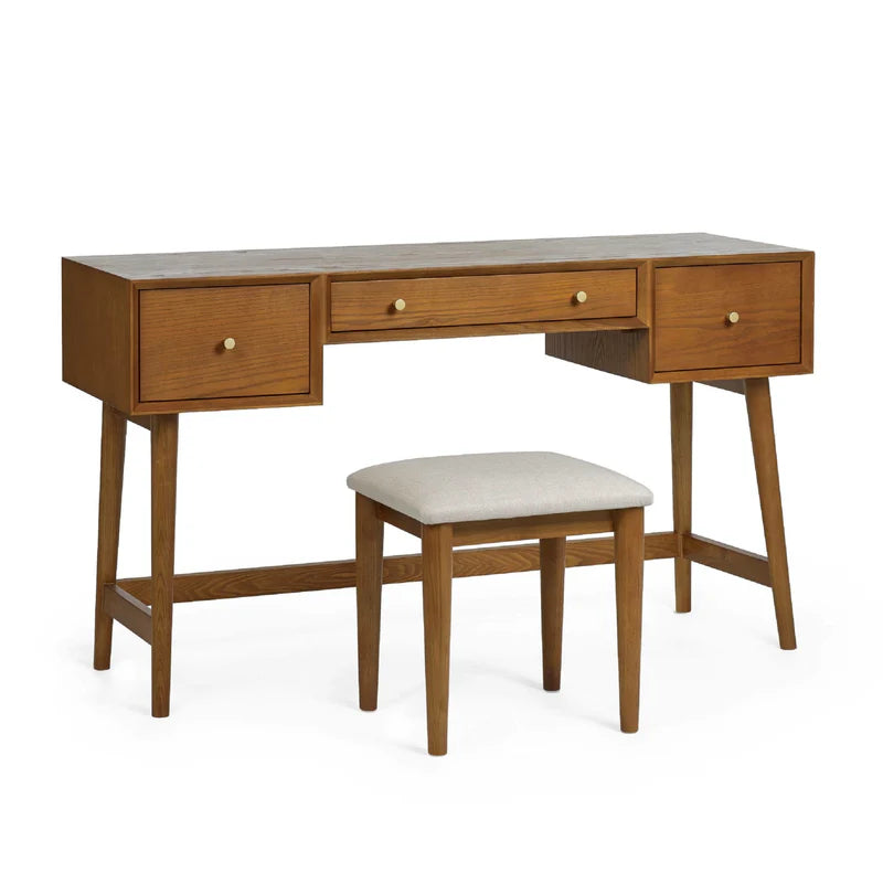 Wooden desk with three drawers and a matching stool on a white background