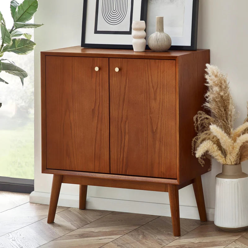 Wooden cabinet with two doors on a white background