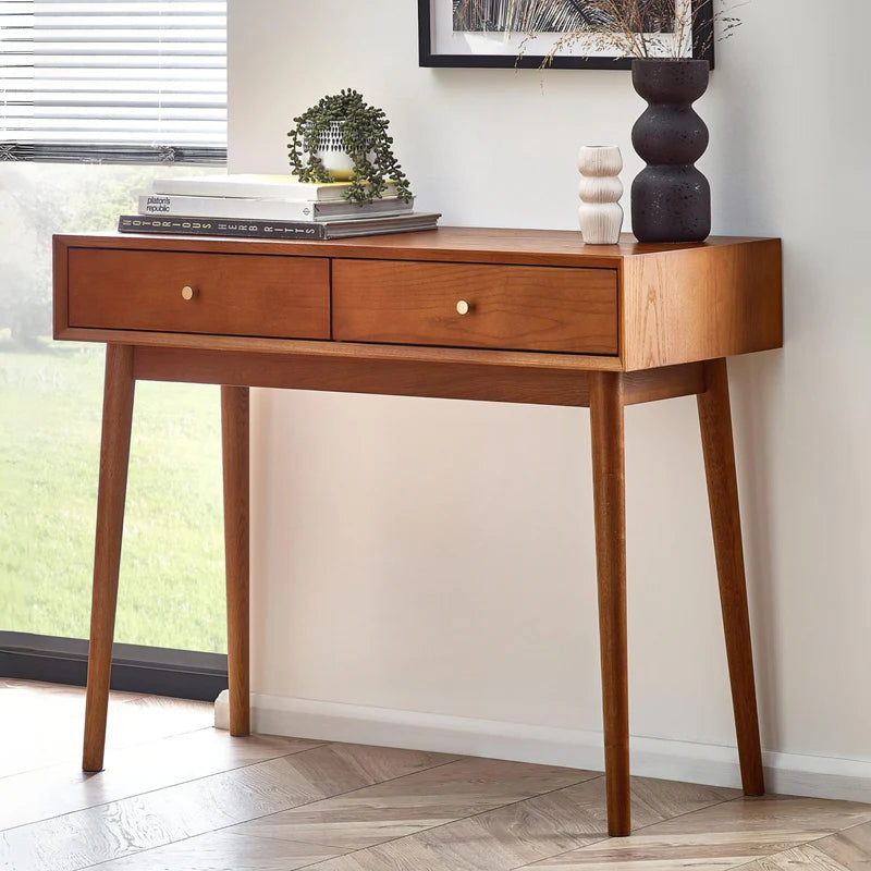 Wooden console table with two drawers on a white background