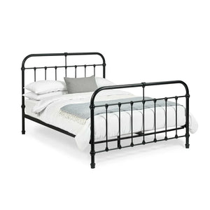 Black metal bed frame with white bedding on a white background