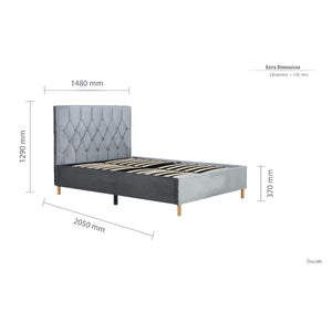 Gray upholstered bed with dimensions on a white background
