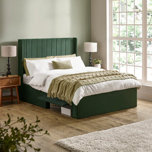 Luca bed frame green roomshot made up with open drawers
