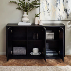 Black cabinet with open doors displaying interior organization, placed against a wall with decorative elements.