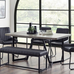 Dining room set with table, chairs, and bench in a modern interior.