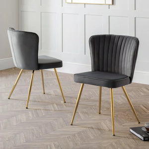 GREY MONZA DINING CHAIR - GOLD METAL LEGS ON A WOODEN FLOOR 