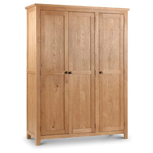Wooden wardrobe with four doors on a white background