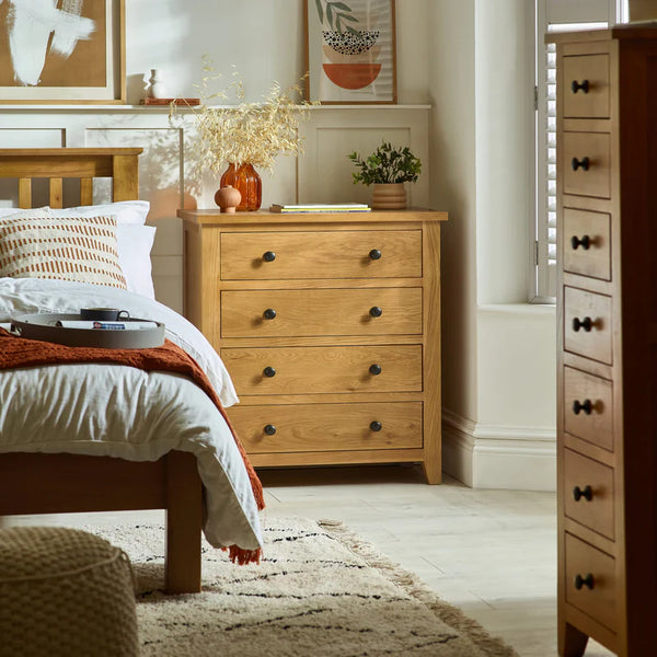 Wooden dresser in a bedroom with decor elements