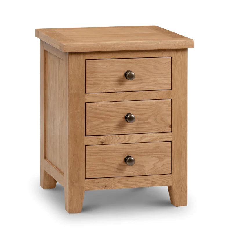 Wooden nightstand with three drawers on a white background