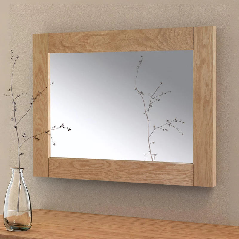 Wooden-framed mirror on a white background