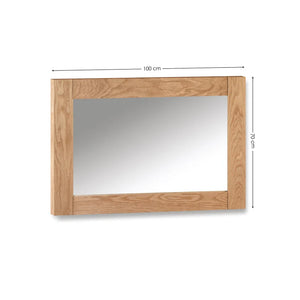 Wooden-framed mirror with dimensions on a white background