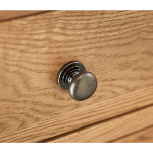 Wooden drawer with a metal knob