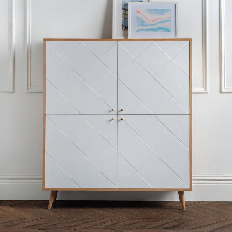Wooden cabinet with white doors on a white background
