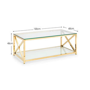 Gold coffee table with clear glass top and shelf, dimensions indicated.