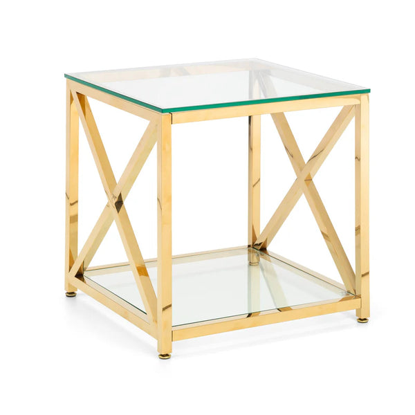 Glass side table with gold metal frame on a white background