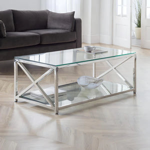 Glass coffee table with metal frame in a living room setting