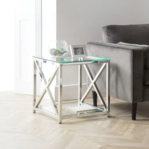 Glass side table with metal frame in a living room setting