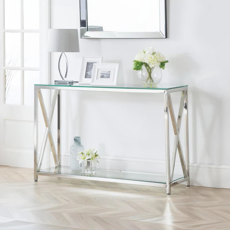 Glass console table with metal frame on a white background