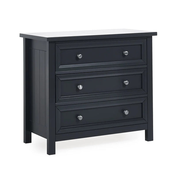 Black dresser with white top on a white background