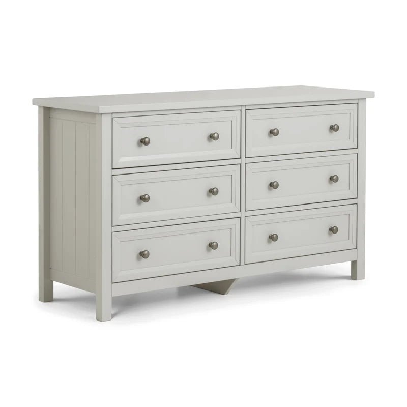 Light gray dresser with six drawers on a white background