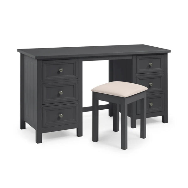 Dark wood desk with multiple drawers and a matching stool on a white background