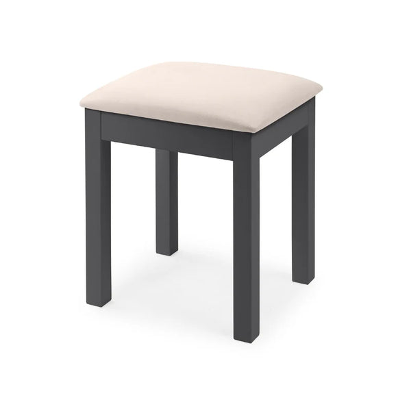 Stool with a beige cushion on a white background