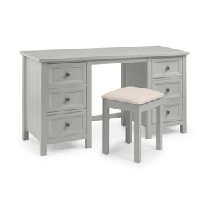 Gray desk with multiple drawers and a matching stool with a beige cushion on a white background
