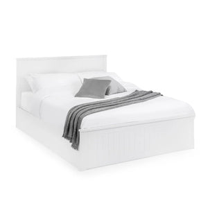 White bed with gray bedding on a white background
