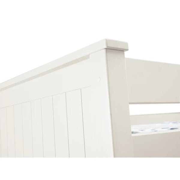 White wooden bed frame with slatted design on a white background