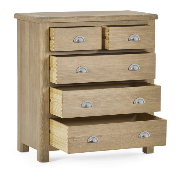 Wooden dresser with five drawers on a white background