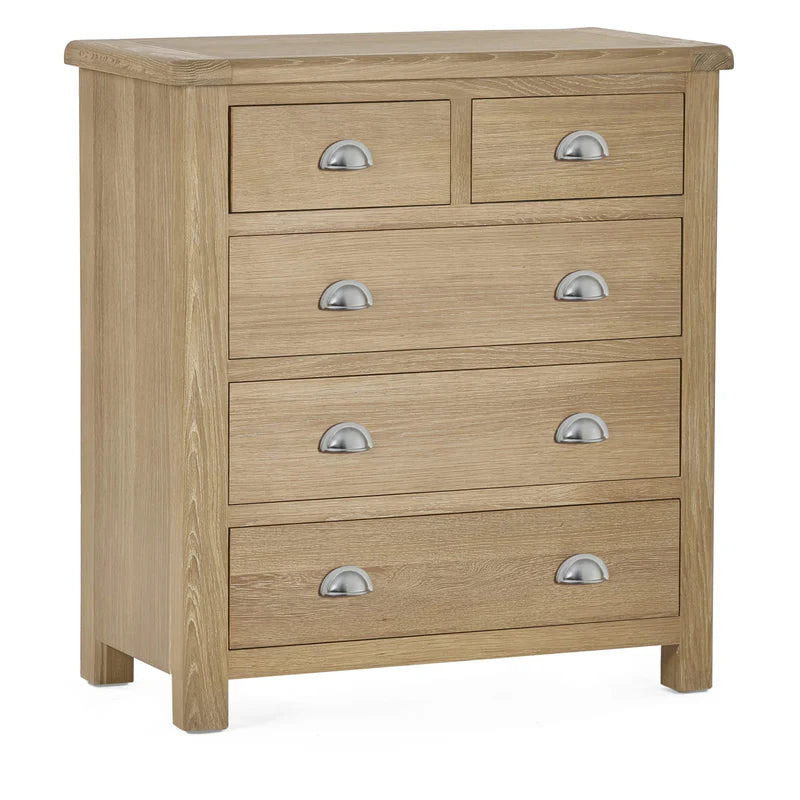 Wooden dresser with six drawers and metallic handles on a white background