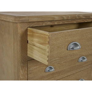 Wooden drawer unit with three drawers and metallic handles on a white background