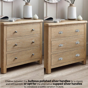 Wooden dresser with bulbous and cupped silver handles on a neutral background