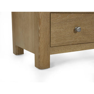Wooden drawer with a knob on a white background