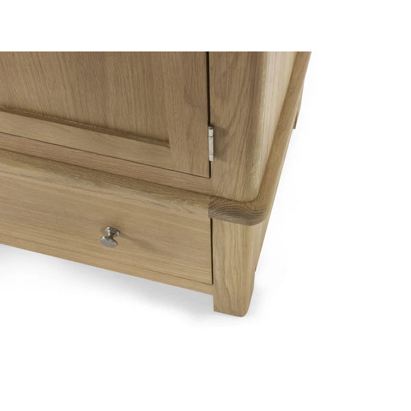 Wooden wardrobe with a single drawer on a white background