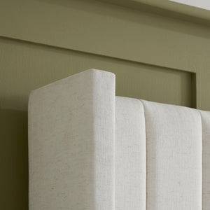 Close-up of a textured wall corner with a neutral color scheme