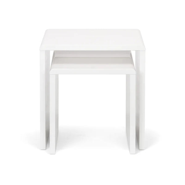 Two white nesting tables on a white background