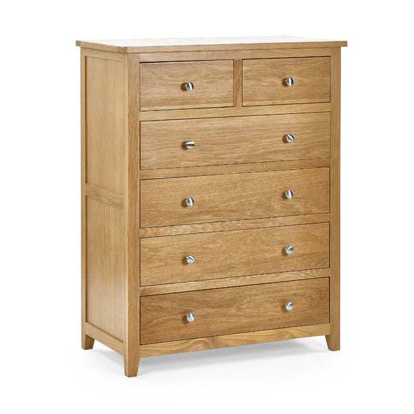 Wooden dresser with multiple drawers on a white background