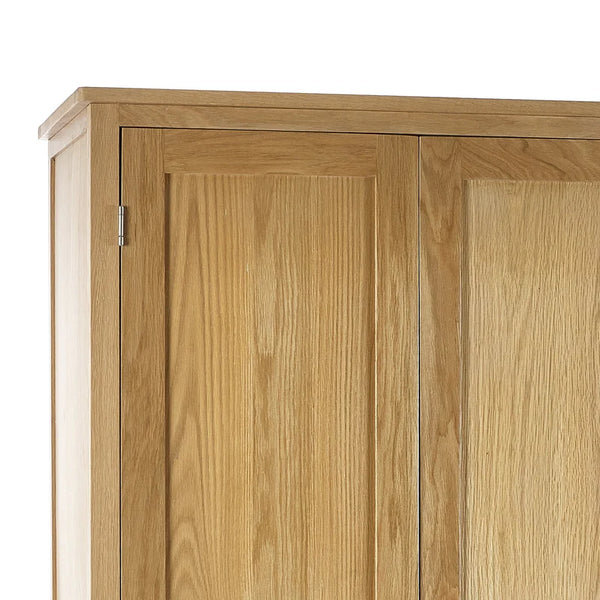 Close-up of a wooden wardrobe with two doors on a white background
