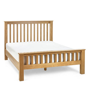 oak slatted bed frame on a white background