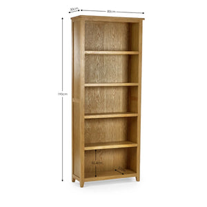 oak bookcase on a white background showing dimensions