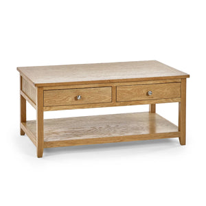 Wooden coffee table with two drawers on a white background