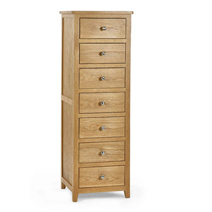 Wooden dresser with seven drawers on a white background