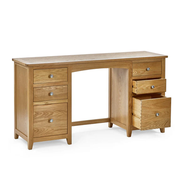 Wooden desk with multiple drawers on a white background