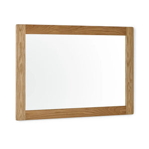 Wooden frame mirror on a white background