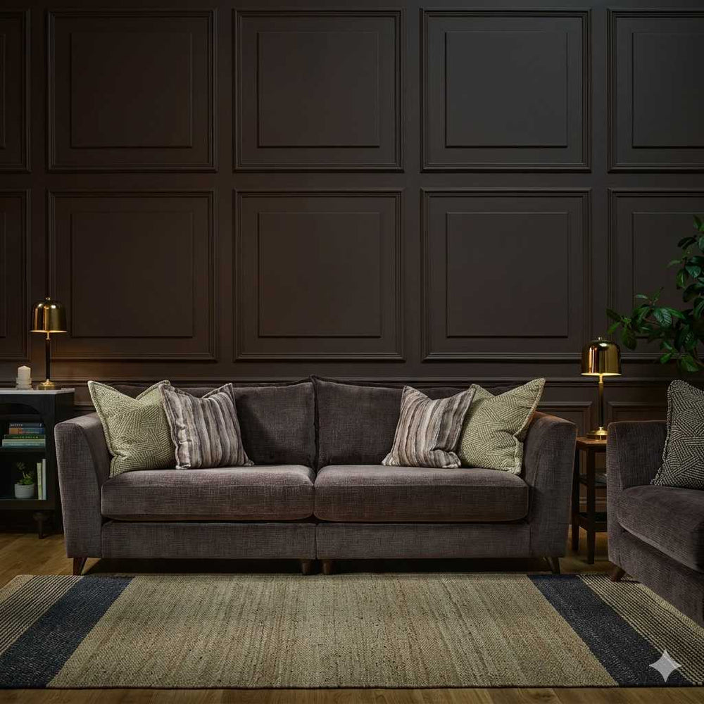 Brown sofa with patterned cushions on a white background