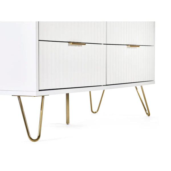 White cabinet with gold legs on a white background